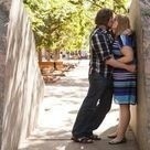 Rexford kissing Jaclyn against a rock